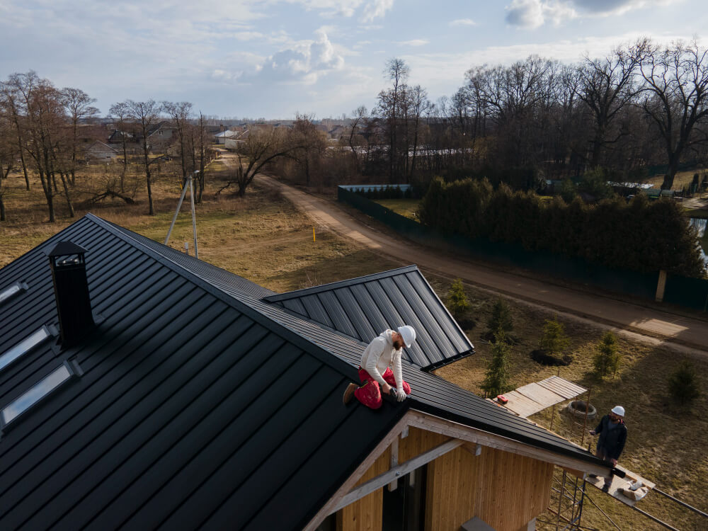 Restored Victorian slate roof with red clay ridge tiles